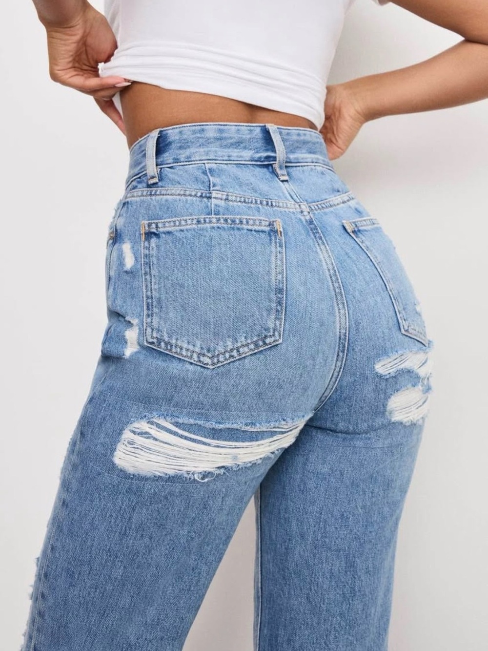 Good American High-Rise Light Blue Distressed Jeans - The Khloè Jean